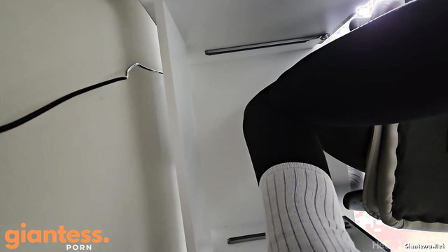 Heels Daze Org - Busy Giantess In Grey Socks: Working On Her Laptop In The Tiny Office