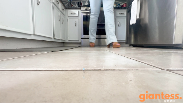 Girl Walks On the Floor In The Kitchen