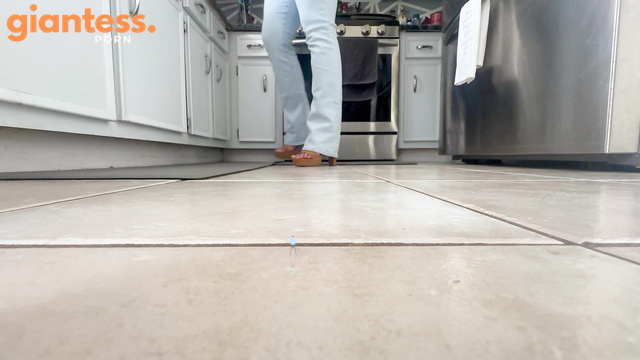 Girl Walks On the Floor In The Kitchen