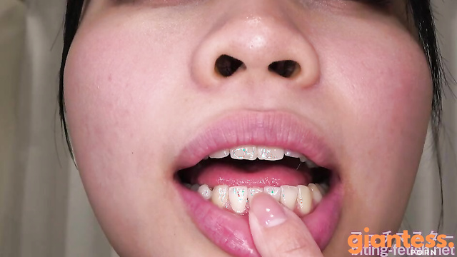 Japanese Asian Biting Mouth Fetish - Showing inside cute girl's mouth, chewing gummy candys, sucking fingers, licking and sucking human doll, and chewing dried sardines