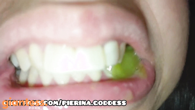 Giantess Enjoys Chewing Tiny Grapes in a Sensual Fetish Fantasy